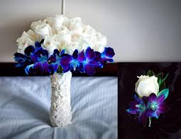 Maybe you would like to learn more about one of these? Ivory Rose And Blue Orchid Corsage Galaxy Blue Orchid Ivory Rose Wedding Buttonhole Satin Ribbo Blue Orchid Wedding Orchid Wedding Theme Blue Wedding Flowers