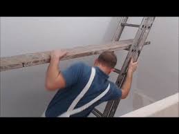 If you're going to invest in a ladder for home use, take a look at the velocity m22 by little giant ladders. What Scaffold To Use For Decorating A Staircase Youtube