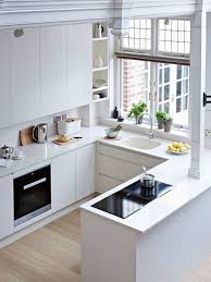 El contraste lo aportan los electrodomésticos de acero inoxidable. 24 Cocinas De Color Blanco