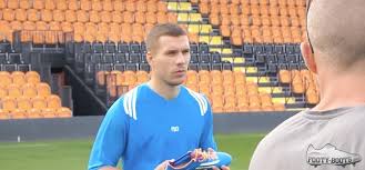 June 15, 2014 porto seguro: Lukas Podolski Talks F50 Adizero Arsenal Germany Footy Boots