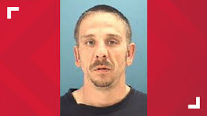 Indianapolis man arrested after throwing gasoline, setting man