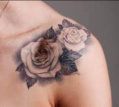 10 White Rose Tattoo Samples And Design Ideas White Rose Tattoos Rose Tattoos Chest Tattoos For Women