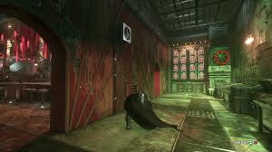 Glide south, towards the wooden wall beside the water #2. Arkham Knight Hq Riddler Trophies Batman Ak
