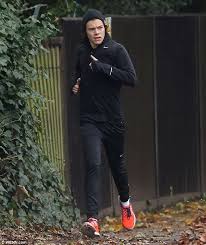 A couple are from the late late show's crosswalk. Harry Styles Kicks Off New Fitness Regime As He Goes For A Jog In The Rain Daily Mail Online