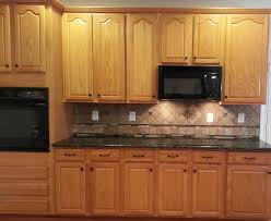 Caledonia granite with honey oak cabinets google search. Home Desain Kitchen Backsplash Ideas With Oak Cabinets