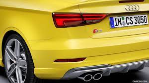 Black vehicle, black car, sports car, bokeh, tail light, downtown. 2017 Audi S3 Cabriolet Color Vegas Yellow Tail Light Tailpipes Caricos