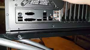 I have seen tutorials of this and they all put the i/o shield in from the inside of the case. Io Shield Installation Youtube