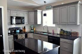 Black Appliances And White Or Gray Cabinets How To Make It Work Grey Painted Kitchen Kitchen Cabinets With Black Appliances New Kitchen Cabinets