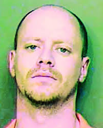 Polo felon charged with trying to set a house