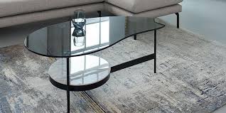 Terrazzo stone shapes up as the perfect host for books, mags and snacks. Coffee Tables Modern Glass Marble Wooden Designs Dwell