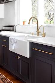 White cabinets dark wood floor white subway tile marble counter. Farmhouse Metal Backsplash Photo Jobsatbournemouth Com