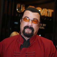 Steven Seagal tours bombed Ukrainian POW camp after hailing Vladimir Putin  'one of world's greatest leaders'