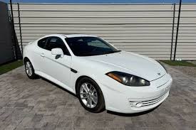 Image result for Bright Silver 2000 Tiburon
