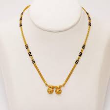 Tips Trends In The Mangalsutra A Symbol Of Love Marriage India S Wedding Blog Gold Mangalsutra Designs Black Beaded Jewelry Gold Necklace Indian Bridal Jewelry