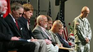 Solemn salute to Ocala troops