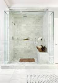 Chic Master Shower Features Ceiling And Walls Clad In Marble Brick Tiles Fitted With A Marble Shelf Ledge Finished With A Marble Pencil Rai Master Bathroom Shower Marble Tile Bathroom Shower