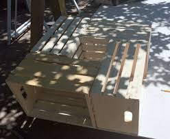 With little more than a few lengths of lumber, some stock legs, and a sheet of acrylic, you'll have a diy display. Diy Distressed Wood Crate Coffee Table Jenns Blah Blah Blog