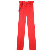 red skinny trousers with chain