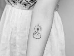 The rose was an integral part of beauty and the beast, resulting in many fans have created stunning fan art and tattoos of the flower. Beauty And The Beast Tattoo A Unique Story With A Tattoo Design To Match Body Tattoo Art
