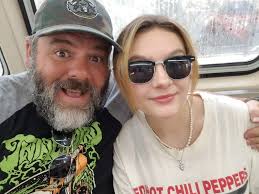 Wizard crowdsurfing picture at riot fest