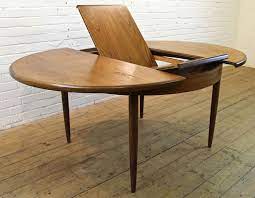 Vintage G Plan Fresco Teak Round Extending To Oval Dining Table 1960s Retro Round Extendable Dining Table Oval Table Dining Dining Table Excellent condition with newly upholstered seats.