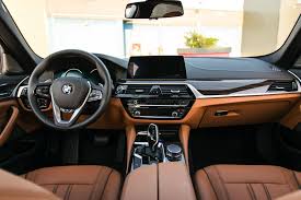 Bmw 5 Series Vs Mercedes E Class Vs Audi A6 Spied Bmw 5 Series Lci Interior Seen With New Gauges And Idrive Bmw 5 Series Bmw Transportation Design