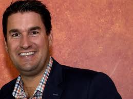 Rug company founder speaks to new citizens