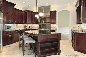 dark cherry color kitchen cabinets and