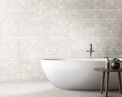 Specialists in the design and supply of mosaic tile schemes. White Hexagon Galaxy Wall And Floor Porcelain Tile Luxury Tiles
