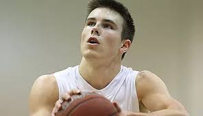 Johnnies' Large Lead Dissolves in 82-77 Overtime Loss