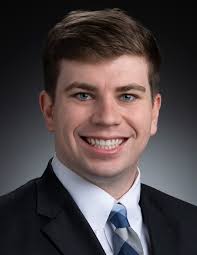 Software Project Management for the Defense Advanced Research Projects  Agency Spectrum Collaboration Challenge