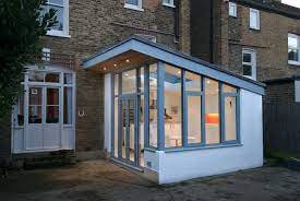 What A Great Way To Open The Kitchen Into The Backyard And Sliders To The Patio House Extension Design House Extensions Garden Room Extensions