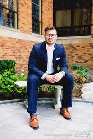 #dt's suits #brown shoes #the striped suit #the leopard tie. Groom In Blue Suit With Pink Bow Tie And Brown Dress Shoes Pink Bow Tie Brown Dress Shoes Blue Suit