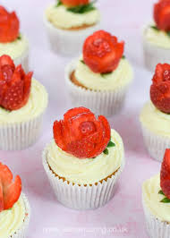 Lydia enjoys cooking in her kitchen. Strawberries Cream Cupcakes Recipe With Strawberry Roses Eats Amazing