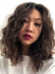 Medium layered wavy hairstyle medium layered haircut for wavy hair 2019 see also: 15 Modern Perm Haircuts For Women Styles At Life