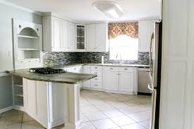 The cool white finish of the boards catches the incoming light from the windows, leaving the space bright, fresh, and spacious while the nicely contrasting muted colors on the flooring. How To Make A Mood Board For A Room Design And Kitchen Refresh Plans Bless Er House