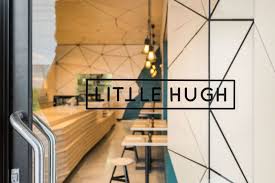 The Interior Of This Cafe Is Covered In Geometric Panel Shapes Best Interior Design Apps Cafe Interior Design Affordable Interior Design