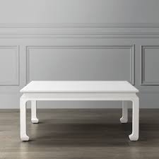 A low coffee table or upholstered ottoman should be placed in the middle of a seating group. Ming Square Coffee Table White Wood Katie Considers