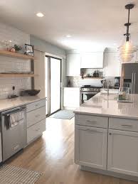 Lowe s stock cabinets review white shaker kitchen kitchen. This Open Floor Plan Is Brightened Up With White Cabinets And Light Wood Floors Kraftmaid Cabinetr Kitchen Flooring Kitchen Floor Plans Kitchen Cabinet Design
