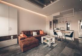 It's fine to choose a tan or taupe color as a backdrop, especially if your furniture is in cooler tones like gray or blue, or the silver metals, because then the two compliment each other nicely. How To Make Your Partially Open Floor Plan Feel Like A True Open Concept