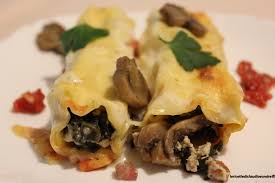 Accendete il forno e portatelo sui 200°. Cannelloni Con Coste Funghi E Prosciutto