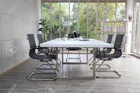 Following table shows the adequate table size for different meeting room sizes. Conference Room With Glass Walls Conference Table And Chairs Stock Photo Picture And Royalty Free Image Image 147951720
