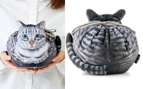 (for all those who are confused, this is about magic: Sitting Cat Pose Bags Get Cuter As You Pack Them Full Japan Today