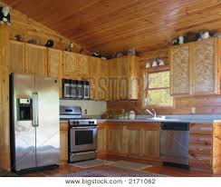 Rustic Wood Ceiling And Walls Rustic Kitchen With Knotty Pine Walls And Ceiling And Stainless Steel Rustic Kitchen Cabinets Rustic Kitchen Rustic Remodel
