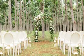 For this backyard wedding dessert table arrangement, securely hang a long valance from tall tree branches. 44 Outdoor Wedding Ideas Decorations For A Fun Outside Spring Wedding