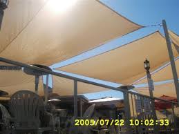 Our garden canopies provide ample shading for your outdoor dining, parties and relaxing in the shade. Sun Shade Sails Residential Deck Patio And Poolside Shelters Commercial And Industrial Tensioned Sail Shade Canopies Sun Sail Shade Shade Sail Shade Canopy