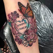 Date In Heart With Flowers And Butterfly Tattoo On Arm By Makkala Rose Butterfly Tattoo Butterfly Tattoos On Arm Tattoos