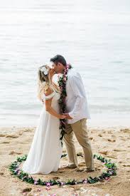 Tropical Wedding On A Hawaiian Beach Couple Honi Kiss After Tieing The Knot On Oahu Wedding Hawaiian Wedding Dress Hawaiian Wedding Hawaii Wedding Dress