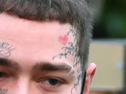 Image result for quirky pylon forehead tattoo