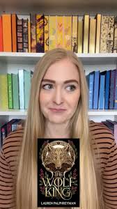 reading an Amazon review for new adult fantasy book, The Wolf in the  Watchtower, book one in a trilogy.